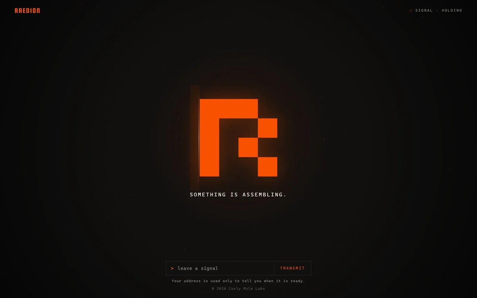 The Raedion holding page: an orange pixel R and the words Something is assembling, with an email sign-up.